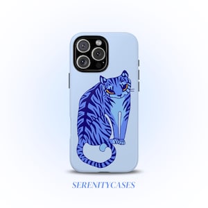 May include: A light blue phone case featuring a blue tiger illustration with orange eyes and dark blue stripes. The phone case has a glossy finish and the text "SERENITYCASES" is printed at the bottom.