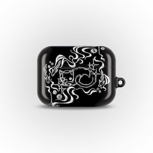 May include: A glossy black protective case for wireless earbuds featuring a white line art illustration of a curled-up cat surrounded by swirling smoke, starburst shapes, and small circular bubbles, with a small side loop for a lanyard attachment.