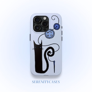 May include: A light blue phone case featuring a black cat illustration with blue eyes, a needle, and blue buttons. The design includes a whimsical, hand-drawn style with the text "SERENITYCASES" at the bottom.