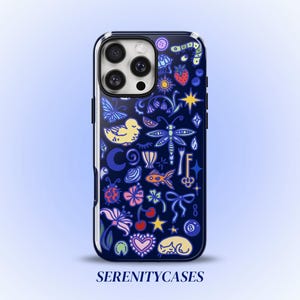 May include: A dark blue smartphone case featuring a repeating pattern of colorful icons including a yellow duck, dragonfly, butterfly, strawberry, fish, cherries, heart, bow, and an eight ball. The text SERENITYCASES is printed at the bottom.