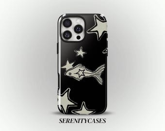 May include: A black smartphone case featuring a repeating pattern of off-white hand-drawn stars and a single fish with a star on its side. The camera lens cutout is visible at the top left, and the text SERENITYCASES is printed at the bottom.