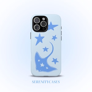 May include: A light blue phone case featuring a blue stingray design with stars and the text "SERENITYCASES". The case has a smooth finish and is designed to fit a smartphone.