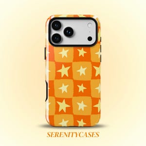 May include: A smartphone case featuring a repeating checkered pattern of orange and light yellow squares, each containing a pale yellow star. The text SERENITYCASES is printed in a simple serif font at the bottom of the image below the phone case.