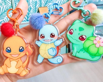 Charmander, Squirtle y Bulbasaur – Llaveros acrílicos con purpurina