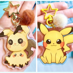 Mimikyu and Pikachu – Glitter Acrylic Keychains