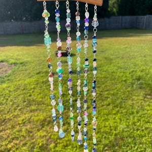 Boho vintage glass bead suncatchers. Each one is unique, one of a kind and handmade. Beaded suncatcher. Hanging crystals for window.