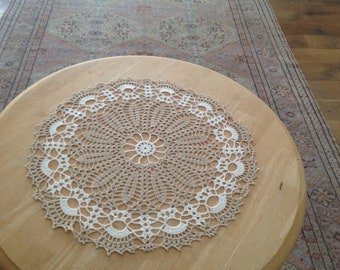 New, light ecru white doily / table center