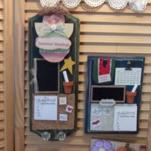 May include: A set of wooden signs with a chalkboard and corkboard for displaying messages and mementos. The signs are decorated with a variety of themes, including spring, summer, fall, and winter. Each sign has a different design and color scheme. The signs are perfect for adding a touch of whimsy and personality to any home.