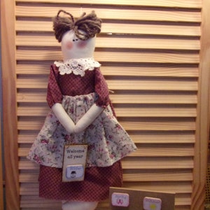 Lacey Doll and her Welcome All Year Seasonal Sign