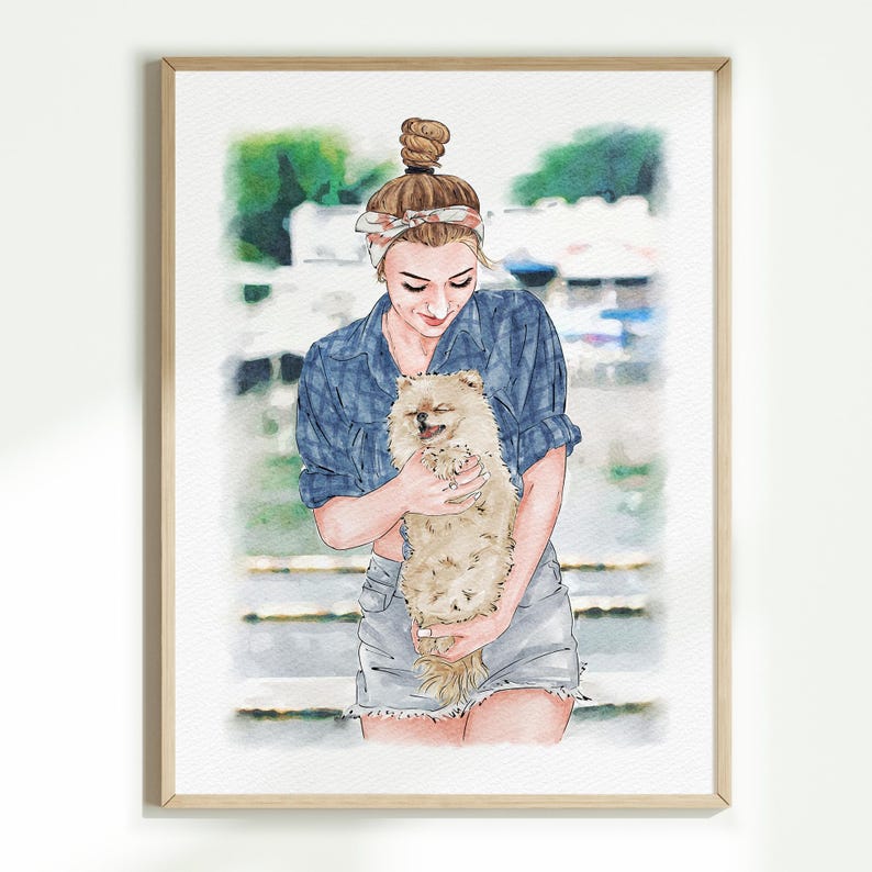 May include: Watercolour portrait of a person holding a fluffy, light brown Pomeranian dog. The person wears a blue plaid shirt and denim shorts. The artwork is framed in a light wood frame.