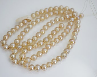 Vintage glaskralen 6 mm lichtgevende topaas glaskraal vintage Japan (95-100 per streng)