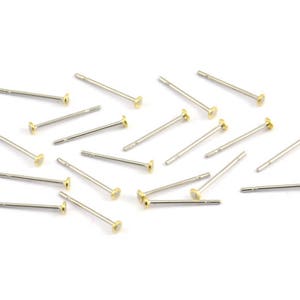 May include: A collection of 18 gold-toned earring posts with silver-toned stems. The earring posts are scattered on a white background.
