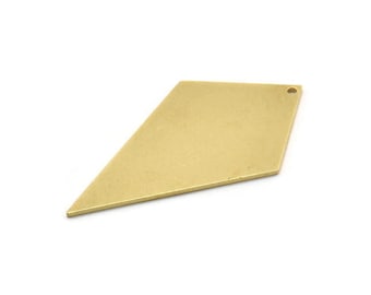 May include: A brass pendant shaped like a kite with a hole at the top for hanging.