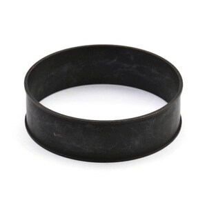 May include: A black rubber ring, probably used as a gasket or seal.