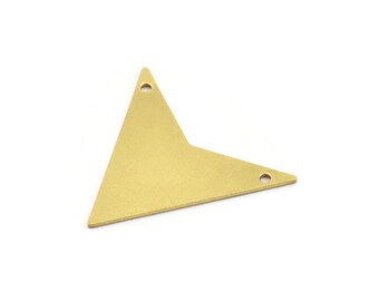 May include: A brass-colored metal triangle with two holes, likely for jewelry making or crafts. The shape is a modified triangle with a pointed end and a wider base. The metal has a matte finish.