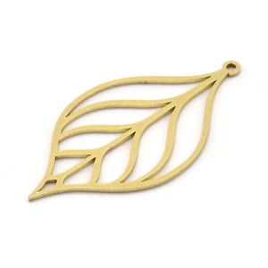 May include: A gold-colored metal leaf charm with a delicate, intricate design. The leaf is cut out, creating a lacy effect. It has a hole at the top for attaching to jewelry or other crafts.