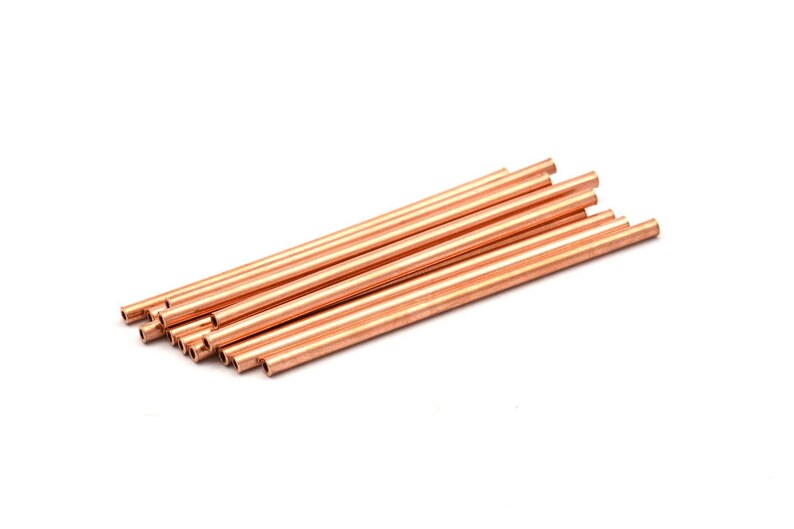 May include: A bundle of 12 copper tubes, each with a smooth, shiny finish. The tubes are arranged in a neat stack, with the ends aligned.