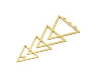 May include: Gold metal pendant with a geometric design of five overlapping triangles. The pendant has four holes for attaching a chain or cord.