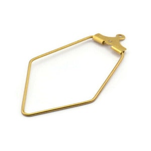 May include: Gold-toned metal diamond-shaped pendant with a small loop at the top.