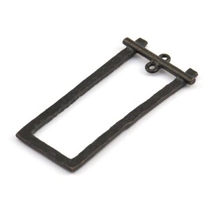 May include: A black metal rectangular frame with a hammered texture and a jump ring attached to the top.