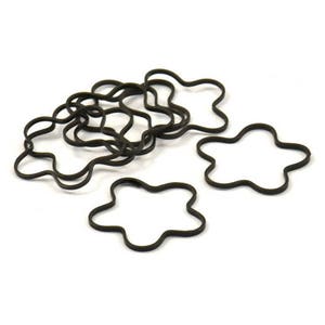 May include: A set of black rubber hair ties shaped like five-pointed stars. The hair ties are arranged in a pile, with some of them overlapping.