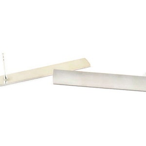 May include: A pair of silver earrings with a rectangular shape. The earrings are simple and modern in design.