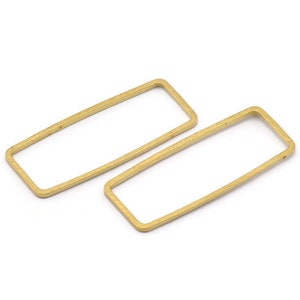 May include: Two gold-toned rectangular metal hoops. The hoops are open and have a smooth, polished finish.