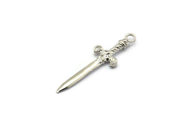 May include: A silver sword charm with a twisted handle and a detailed hilt.