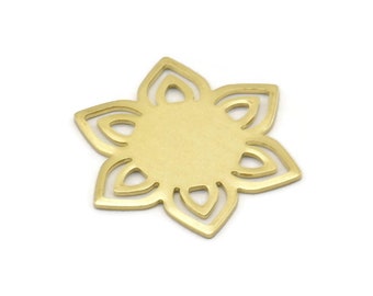 May include: A gold-colored metal charm in the shape of a flower with intricate cutouts. The charm has a circular center and eight petals.