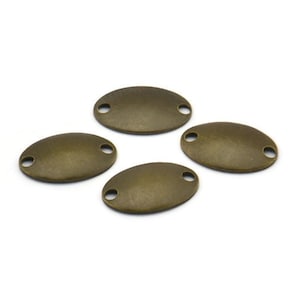 May include: Four antique gold oval-shaped metal charms with two holes each.