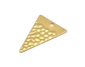 May include: A gold triangle pendant with a textured surface. The pendant has a hole at the top for attaching a chain or cord.