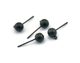 May include: Four black bead head fishing jig flies with a black wire hook.
