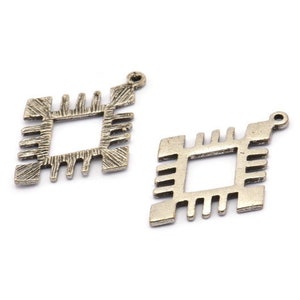 May include: Two silver metal charms in the shape of a square with an inner square. The charms have a textured design and a loop at the top for attaching to jewelry.