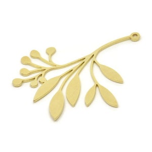 May include: Gold-toned metal charm featuring a delicate branch with leaves and berries. The charm has a loop at the top for attaching to jewellery or other crafts.