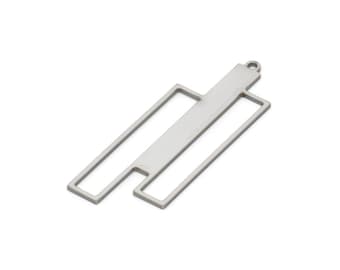 May include: Silver metal pendant with a rectangular shape and a smaller rectangle cut out in the center. The pendant has a loop at the top for attaching a chain.