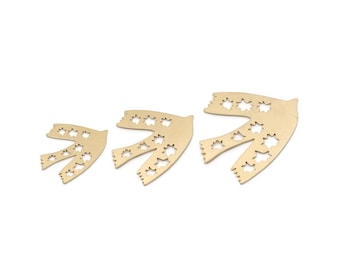 May include: Three gold-colored, bird-shaped ornaments with star-shaped cutouts. The ornaments are arranged from smallest to largest, each with a wing-like structure and a series of star-shaped openings. They are set against a white background.