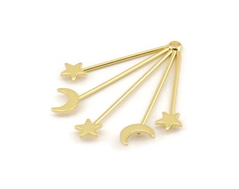 May include: Gold-toned metal charm with five dangling stars and crescent moons. The charm is designed to look like a shooting star with the stars and moons attached to the rays.