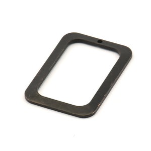May include: A black metal rectangular frame with a small hole at the top.