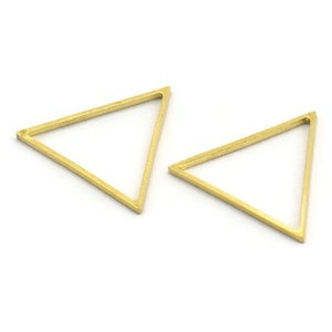 May include: Two gold-colored triangle-shaped metal hoops. The hoops are open on one side and have a smooth, polished finish.