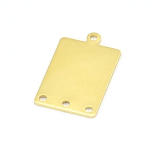 May include: A rectangular brass jewellery component with a loop at the top and three holes at the bottom. The component has a smooth, matte finish against a white background. Suitable for jewellery making.