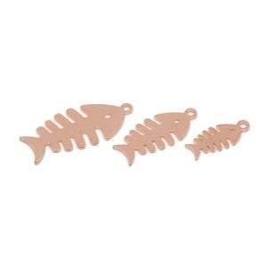 May include: Three rose gold-toned metal fish skeleton charms arranged in a row from largest to smallest. Each charm features a flat, stylized fish bone design with a small circular loop at the top for attachment, showcasing a metallic finish.