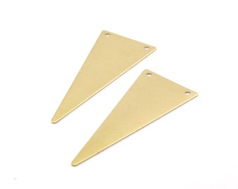 May include: Two gold-colored triangle-shaped metal pieces with holes at the top.