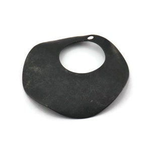 May include: A black metal pendant with a large, irregular, organic shape and a circular cutout in the center.