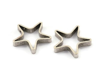 May include: Two silver metal star-shaped charms with an open center. The stars are about 1 inch in diameter.