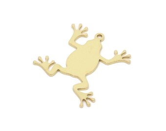 May include: A gold-colored metal frog charm with a hole for attaching to a necklace or bracelet.