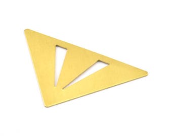 May include: A gold triangle-shaped metal bookmark with three cut-out lines.