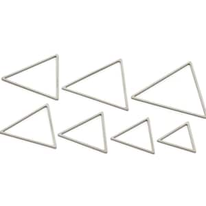 May include: Seven silver-coloured triangle-shaped metal frames of varying sizes are arranged on a white background. The frames are empty and have a simple, geometric design, suitable for crafting or decorative purposes.