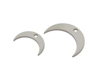 May include: Two silver crescent moon charms with a hole for attaching to jewelry or other crafts.