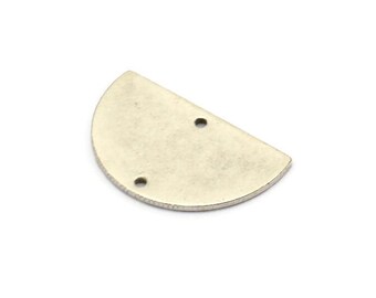 May include: A silver half-circle metal charm with two holes. The charm has a slightly textured surface.