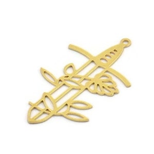May include: Gold-toned metal charm featuring a sword with floral details. The sword is pierced by a leafy branch with a flower at the top.